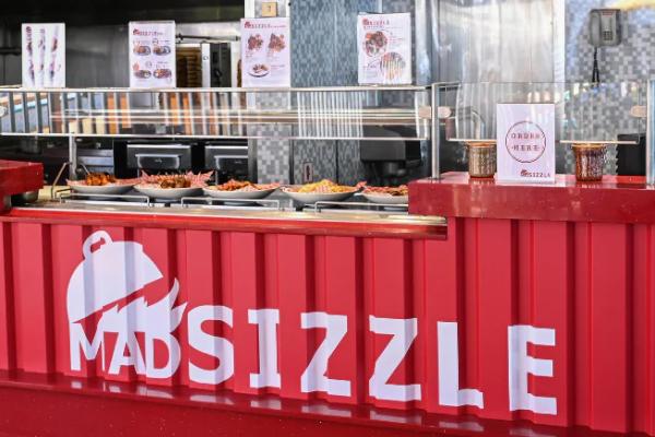 Mad Sizzle serves up an irresistible array of mouth-watering kebabs and satays featuring succulent slow-spit-roasted meats. Groups can dive into the mezze or skewer platters, complete with lashings of hummus, Fattoush mixed greens salad, and pita flatbread - perfect for sharing.