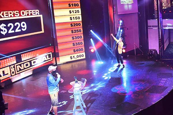 Deal or No Deal at sea brings the TV favorite onboard with two ways to win: get randomly selected to play onstage for up to $1,000, or match your game card from the audience for prizes up to $5,000. Buy one (or more) game cards to boost your chances—18+ to play, everyone’s welcome to watch.
Cost: $
Restriction: 18+