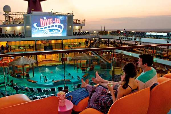 Catch recent blockbusters and big games under the stars at Dive-In Movies on the giant Carnival Seaside Theater screen—watch from a poolside lounger or right in the water, with ocean breezes and big-night vibes.
Cost: Included