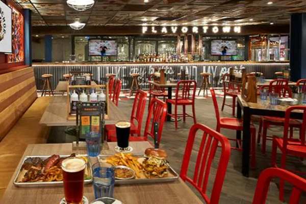 Guy's Pig & Anchor Smokehouse slow-smokes brisket, ribs, salmon, sausage, and dry-rubbed chicken over hickory and apple wood, pairs them with classic sides, pours exclusive onboard-brewed Parched Pig beers (tours and growlers available), and sets it all to live music.
Cost: $