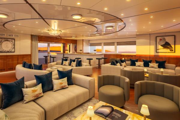 An inviting sanctuary of comfort and style, the indoor lounge presents a refined space to unwind, read, or gather over drinks and conversation.