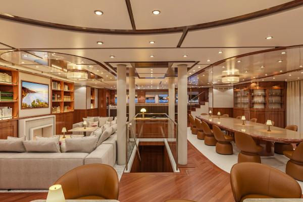 Gather in the ship's elegant social hub, where tasteful decor and luxurious touches provide a sophisticated setting for conversation. Settle into this comfortable indoor retreat, thoughtfully designed for quiet moments and lively gatherings alike.