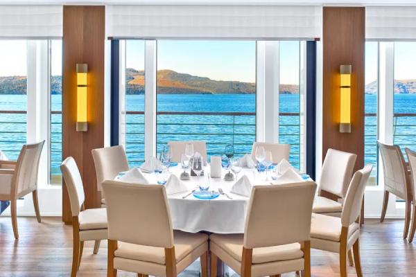 This is the main dining venue, The Restaurant, offers the highest onboard dining experience. Regional cuisine and always available classics are served surrounded by sweeping exterior views through all-glass walls.