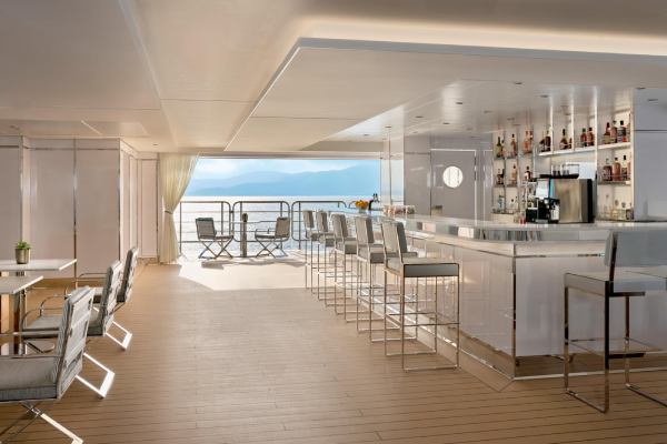 Enjoy drinks and light bites with views of the sea on a spacious terrace just steps above the marina.