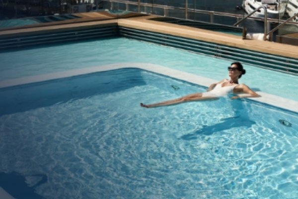 The Main Pool offers with tanning ledges and spacious sundecks for lounging and refreshing drinks served poolside.