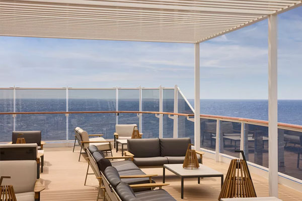 Set on the ship's highest point, this panoramic outdoor lounge setting is ideal for soothing cocktails and infinite views.